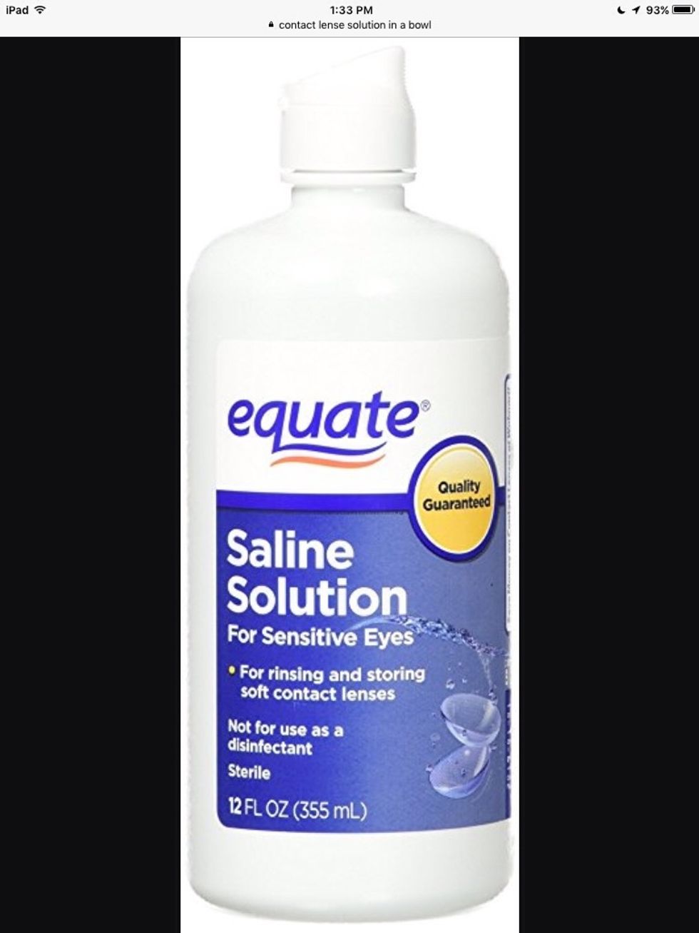 After that, add in the contact lense solution by slowly squirting a little and stiring.