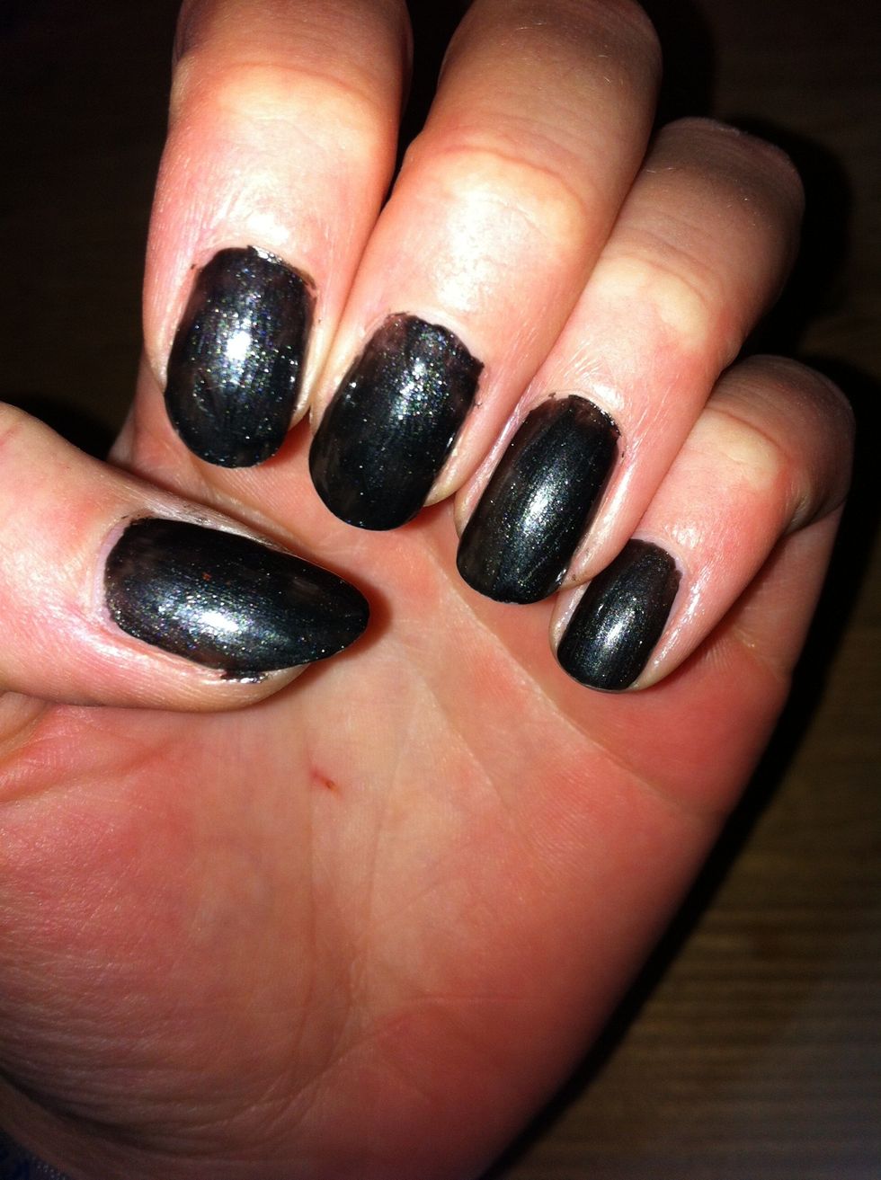 After that, apply a base color. The color I used is a shimmering black one.