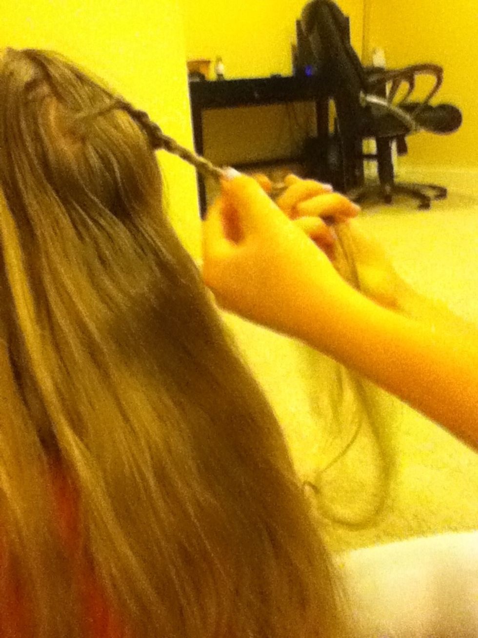 After that braid all the way down. Repeat all steps on other side.