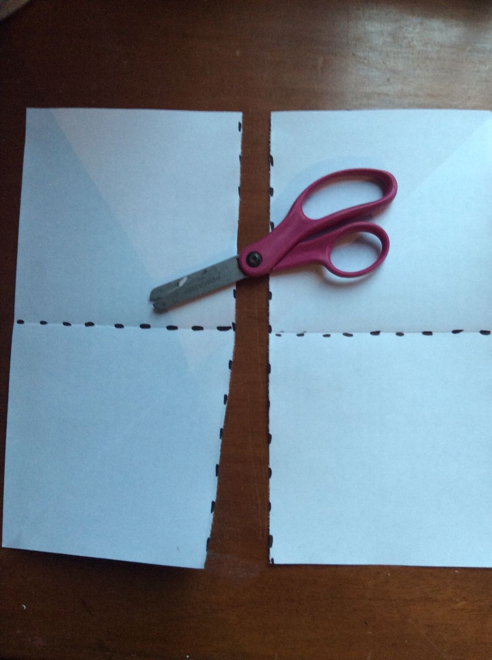 After that, fold it again in a half and cut it just like you did it before.