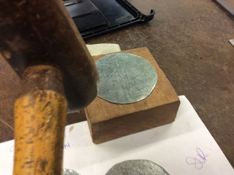 After that get a Tinmans mallet and hit the metal until it is bent into the the shape of a wax catcher (x3).