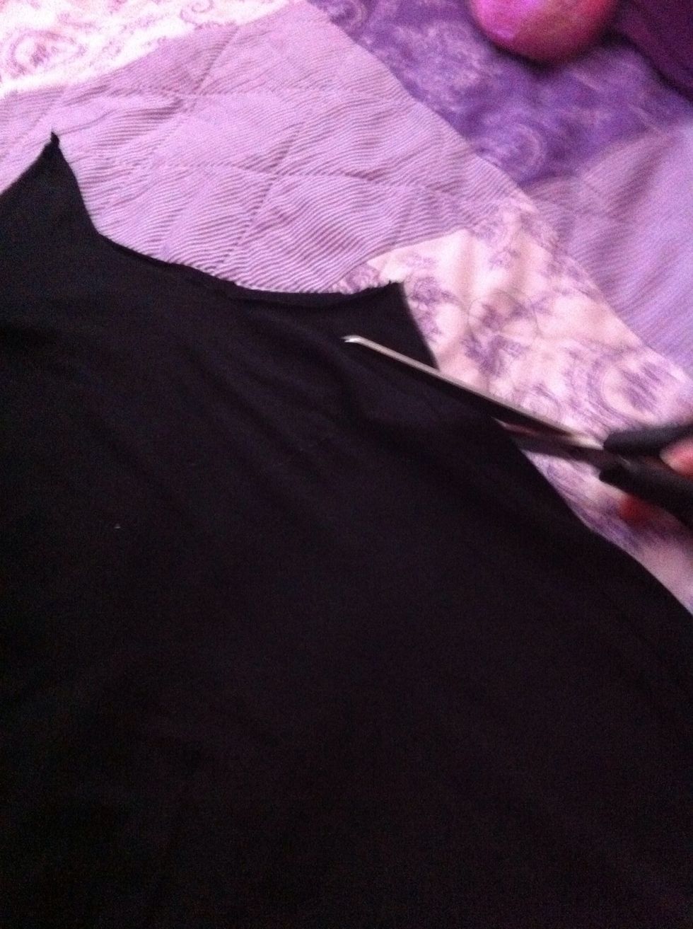 After that , I have cut the sleeves bigger till the middle of the shirt.