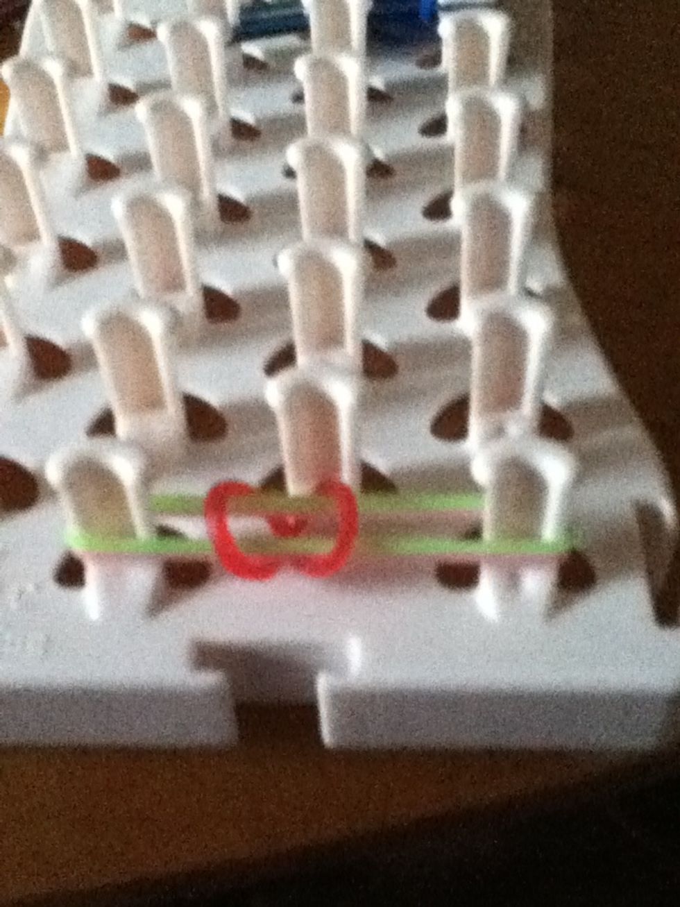 After that put an another ruber band .put it regular .