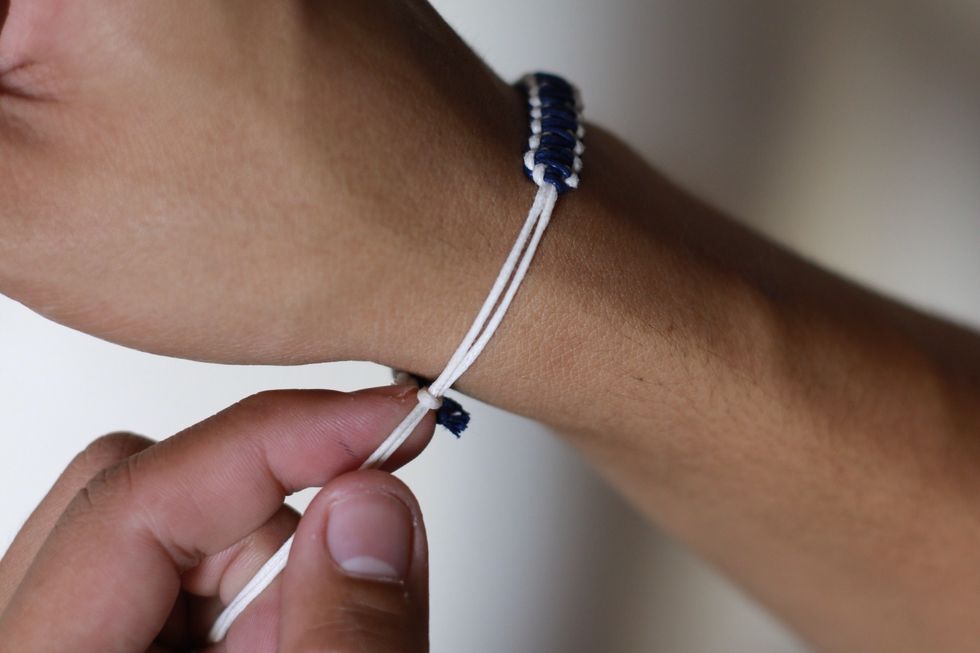 After that, put the bracelets around your wrist to find the desired tightness for your wrist or your friends.