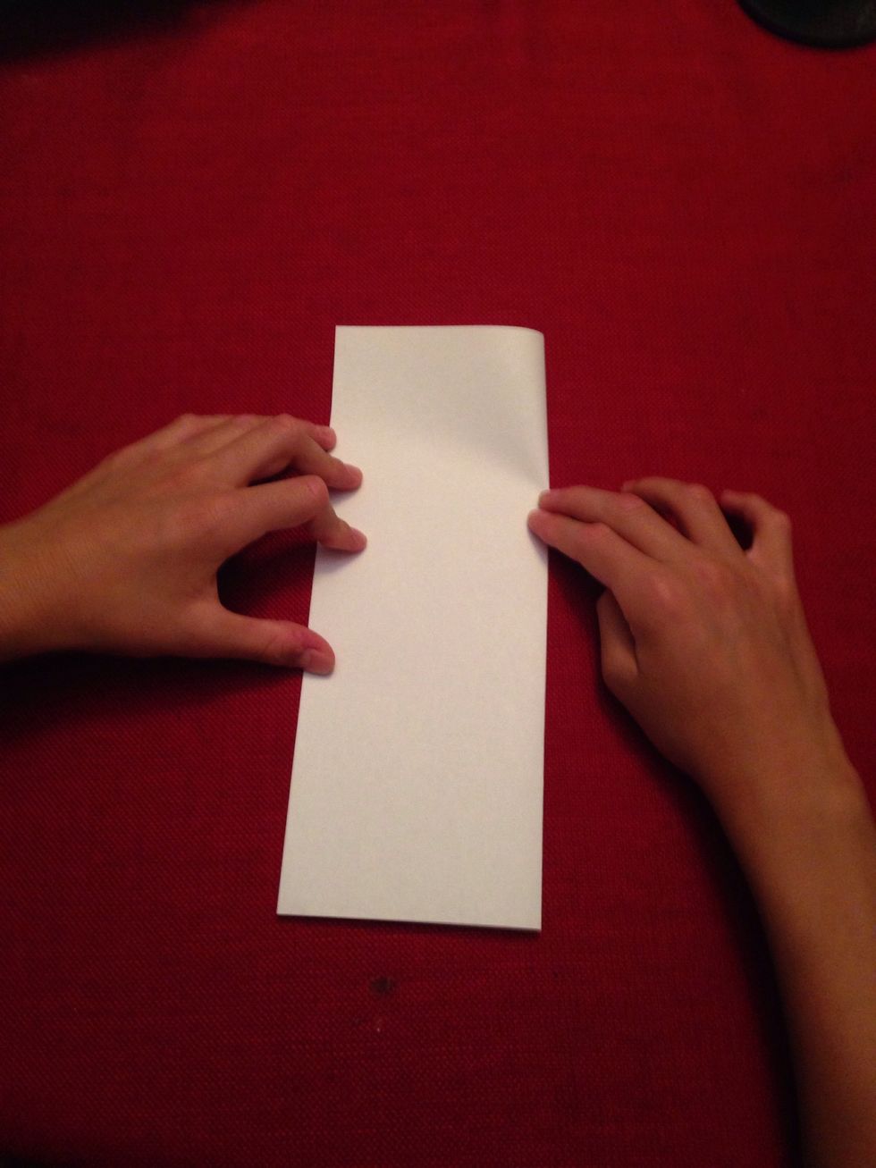 After that, unfold it and fold it the opposite way, then crease