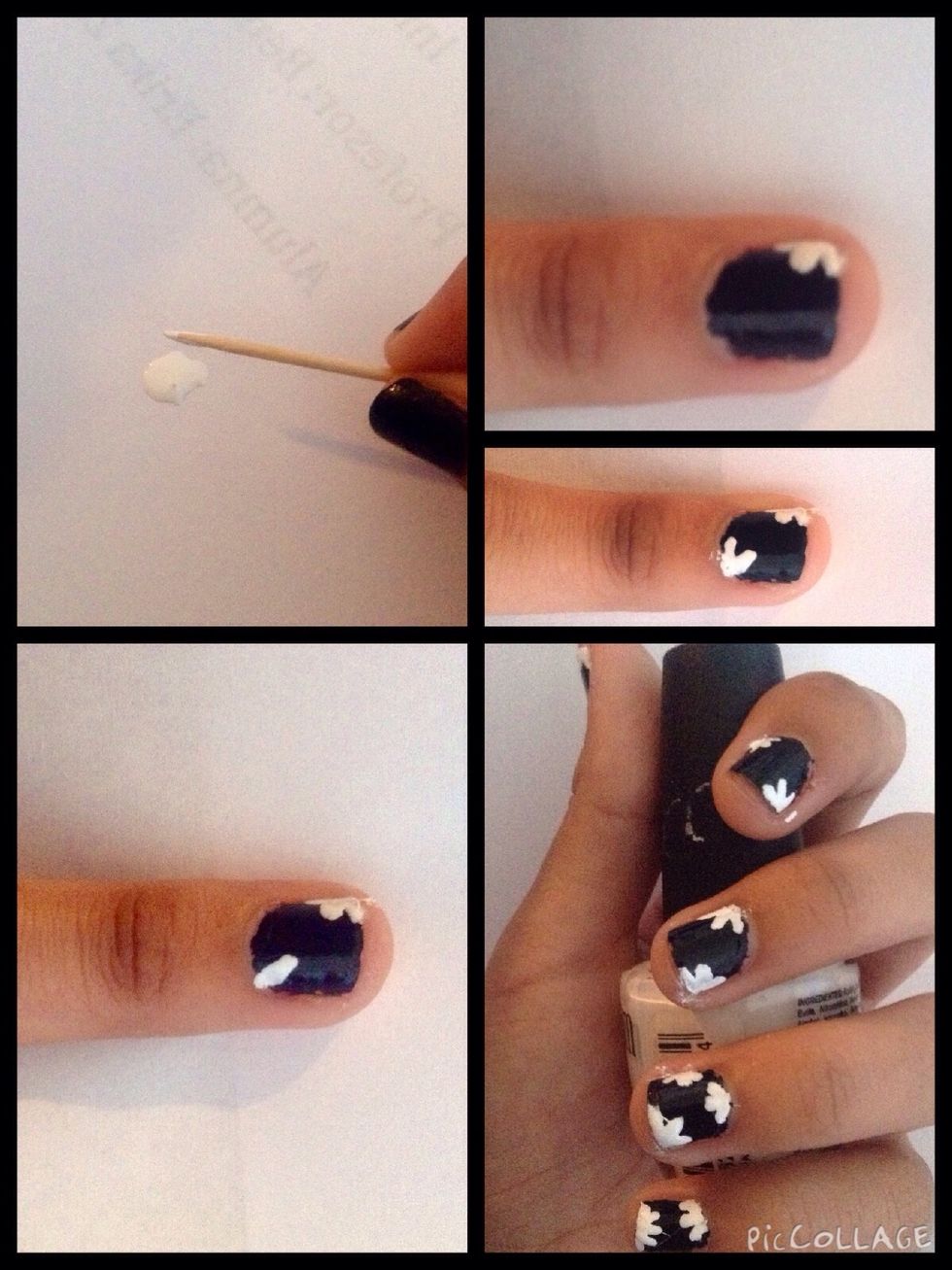 after that, using the stick , paint small petals on your nails. \ud83d\udc85