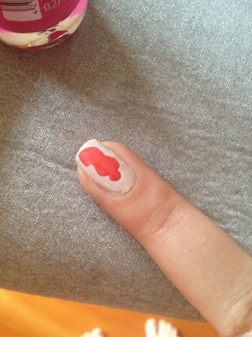 After that you apply your colour on your white base coat.