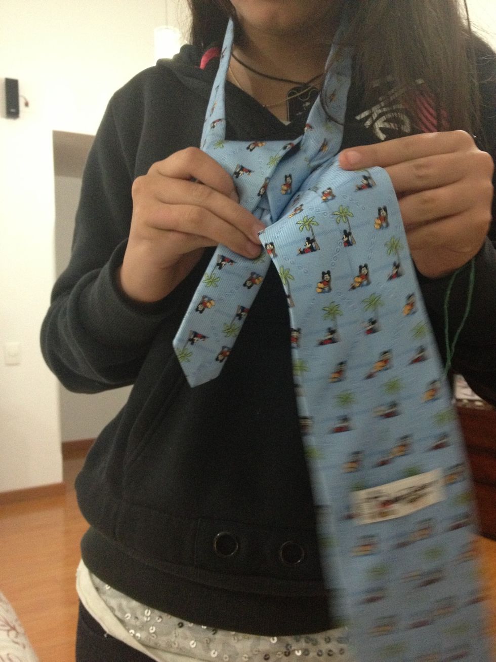 After that you pass the larger piece over the whole thing to the right