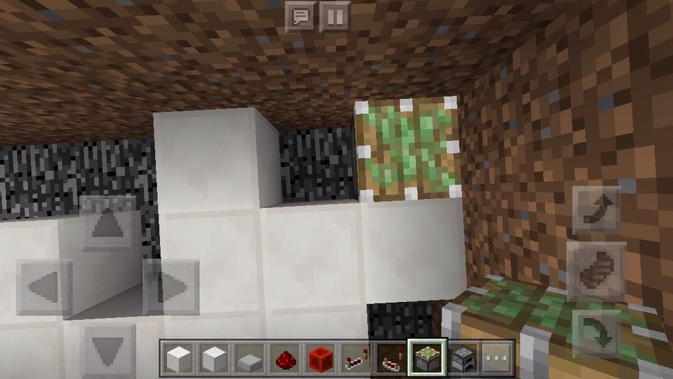 After that, you place a sticky piston in the upper right corner.