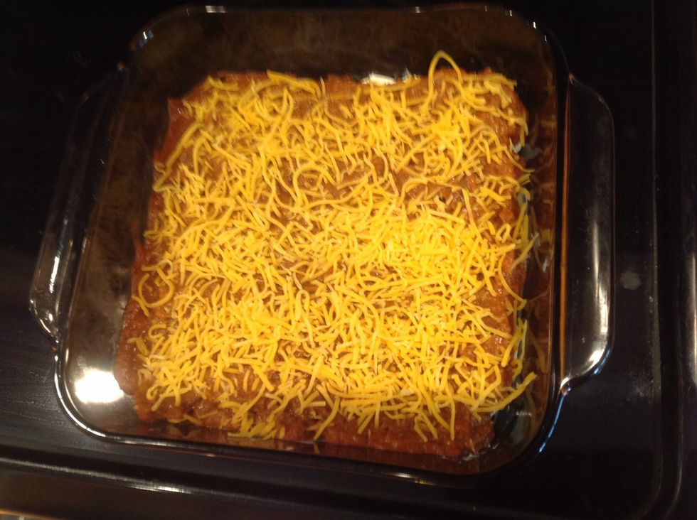 After the 10 minutes, take it out a sprinkle cheese on top