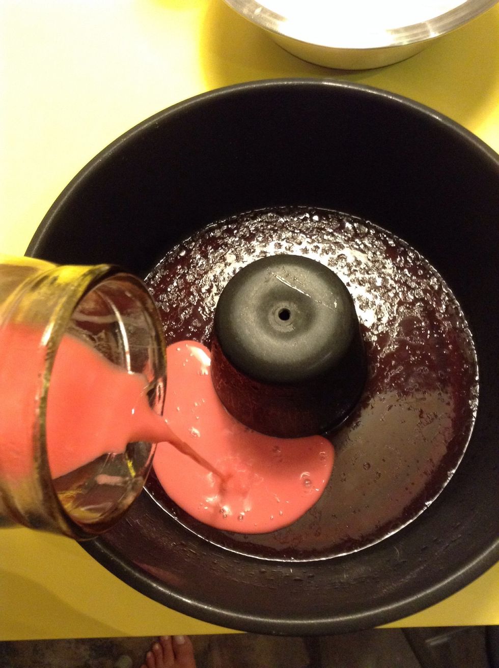 After the 10 minutes, take the pan out of the freezer and pour the "dull" red jello on the top of the shiny one. VERY CAREFULLY, so it doesn't make a hole on the bottom layer.