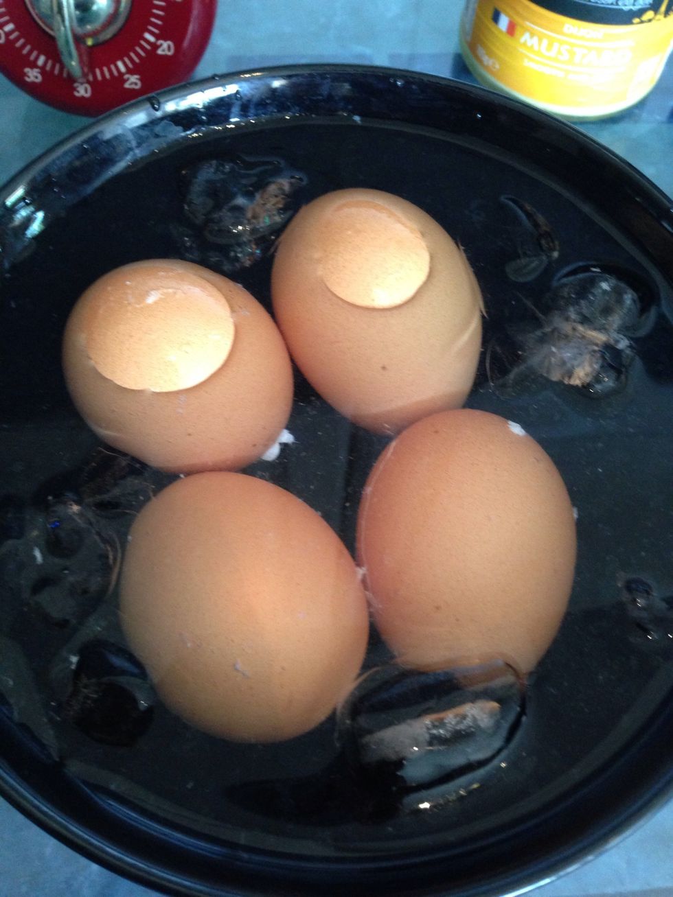 After the 15 mins is up transfer the eggs into iced water to stop the cooking and cool them down, leave in the iced water for about 10 mins