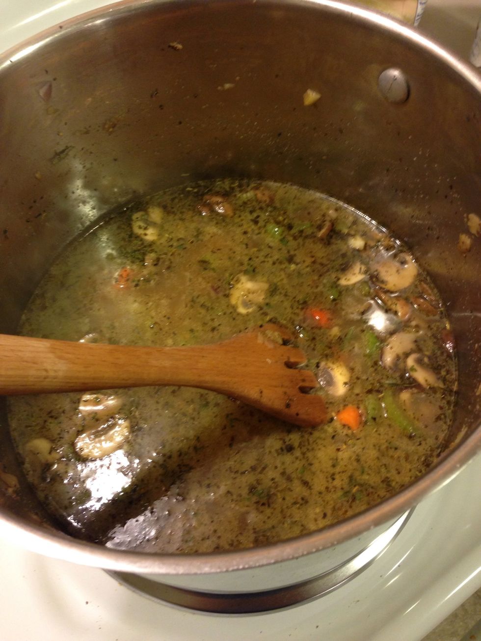 After the 5-7 minutes add stock and bring to a boil