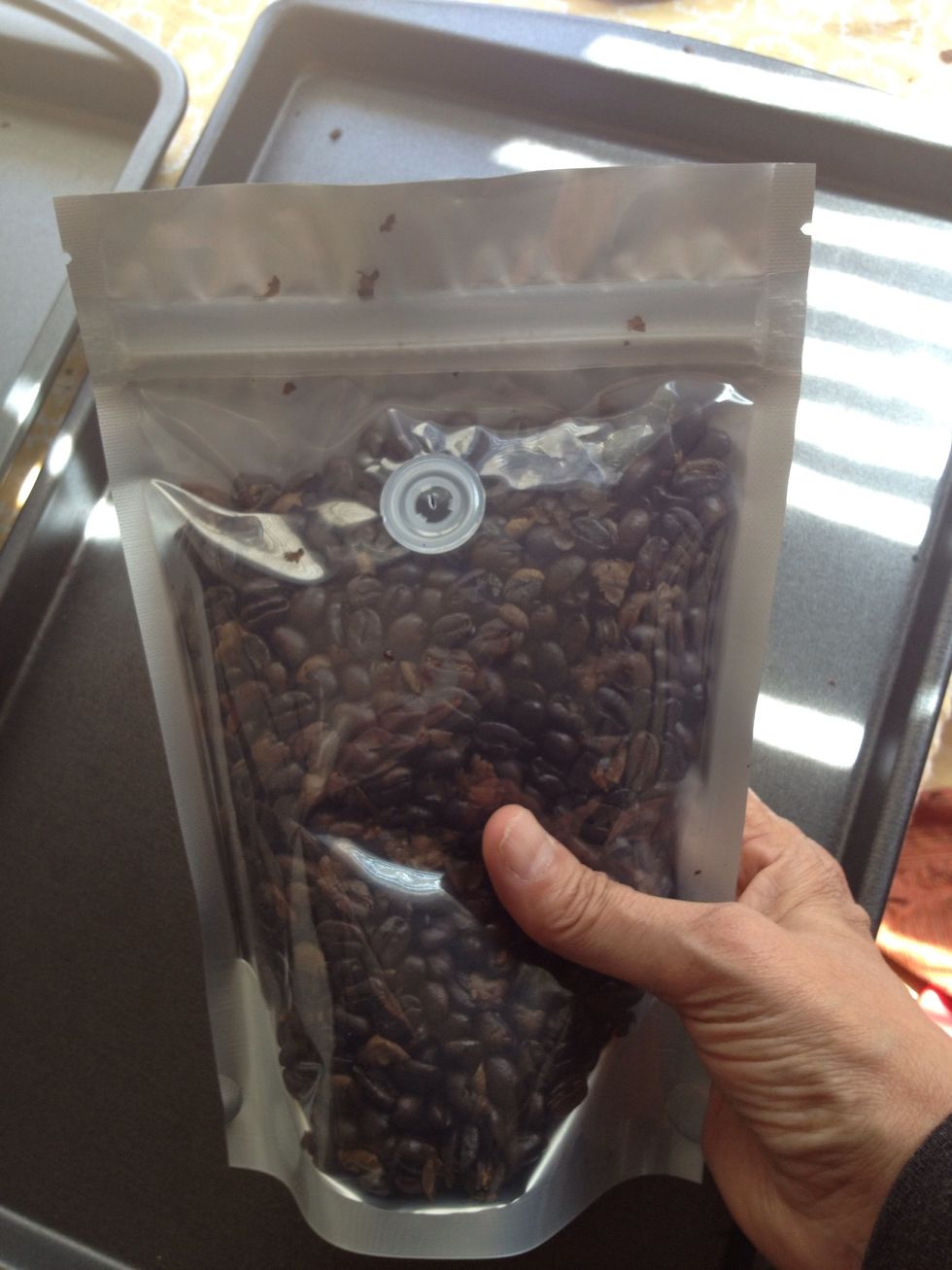 After the beans cool down, immediately store them in an airtight bag or container that includes a 1\u2013way valve which removes air from the bag. Only grind the beans when you're ready to use them.