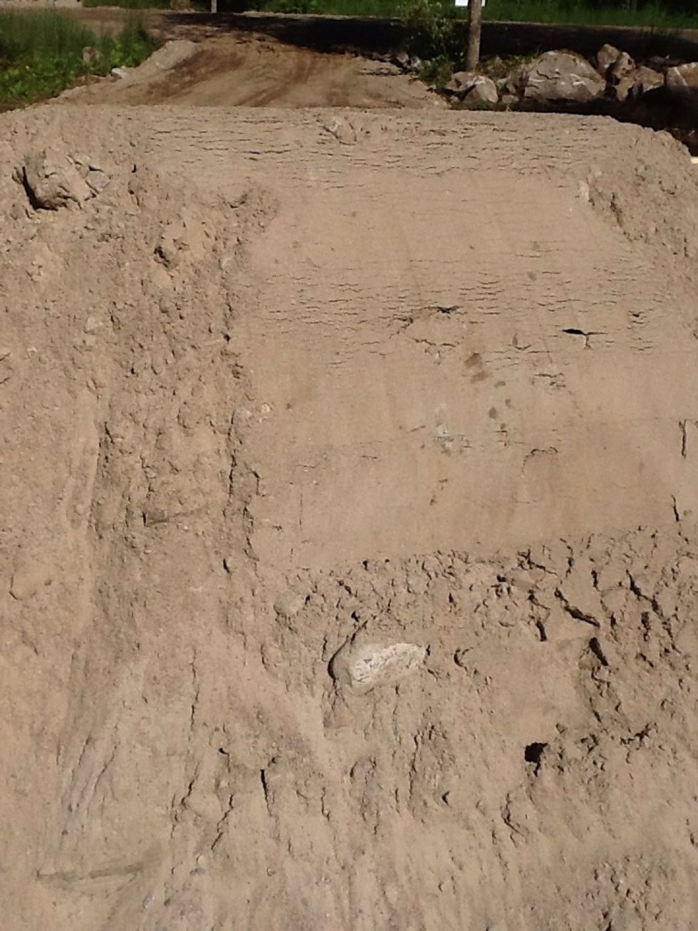 After the building inspector says yes to your pipe and blue skin job you back fill your hole