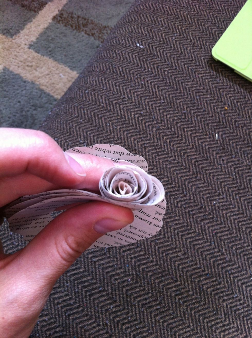 After the center is done begin rolling a little looser so the rose gets wider.