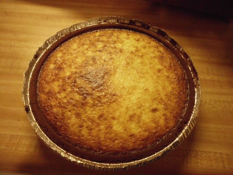 after the cheese cake is out of the oven, let it sit out to cool for a coup of minutes.