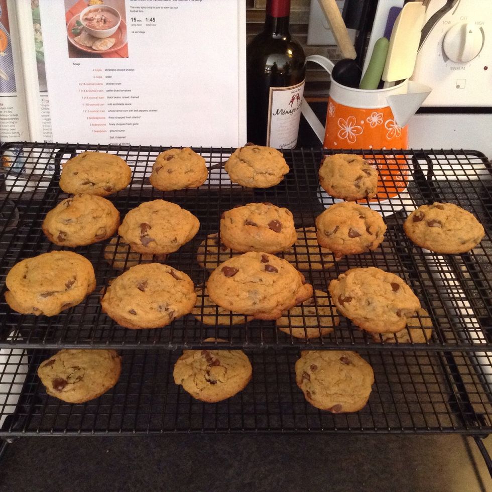 After the cookies are done baking place them on the cooling racks to cool.