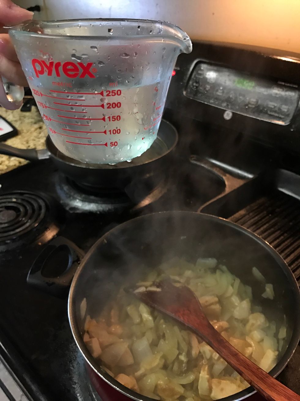 After the curry melt within the chicken and onions, put 250ml water into the chicken curry. (Amount of water is based on the personal flavor)