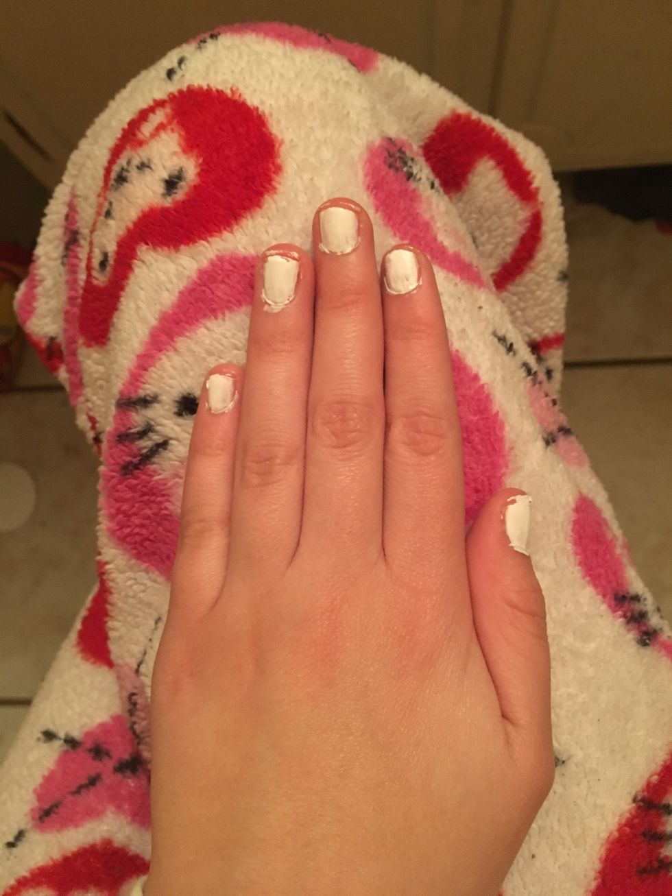 After the first coat dries, add another coat of white on top of it.