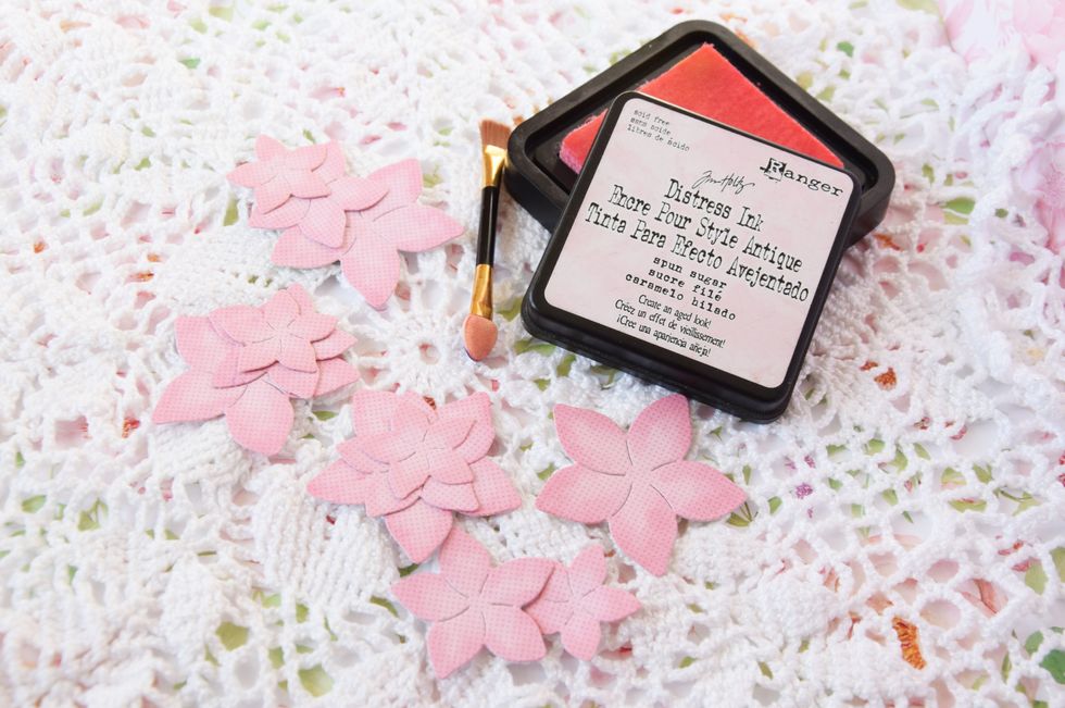 After the flowers are die cut and inked