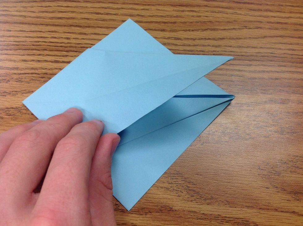 After the folds, the paper should look like this, then do the same to the other side of the paper.