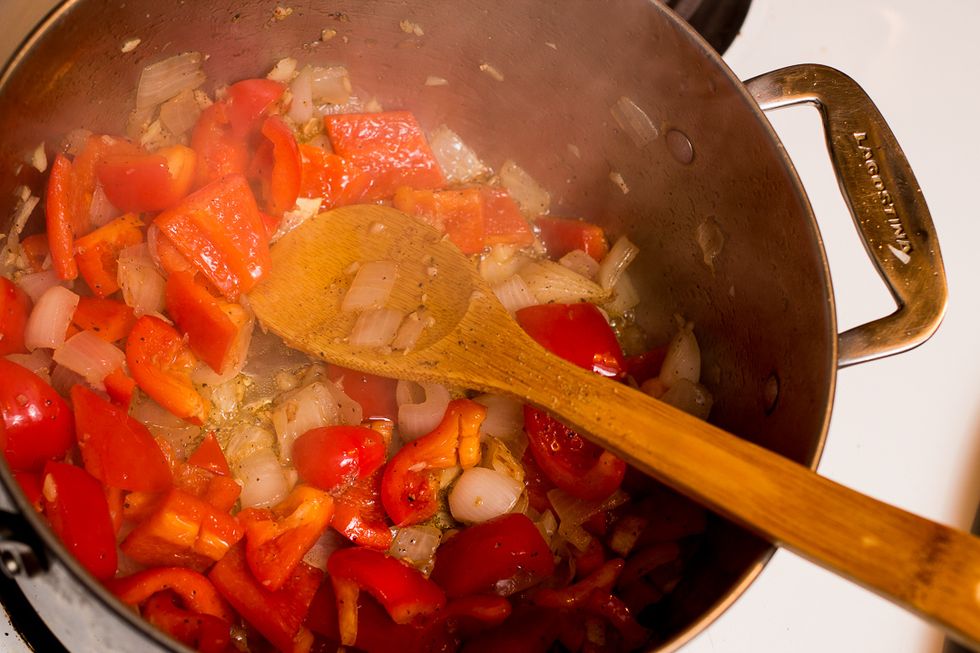 after the garlic sweats a bit, add the peppers.