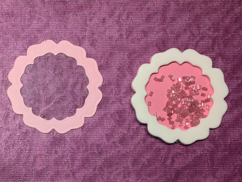 After the glue is dry, fill with tiny beads, rhinestones, sequins, confetti, etc. work well. (The shaker pieces will adhere to any glue that is not dry and of course, they won't shake!)