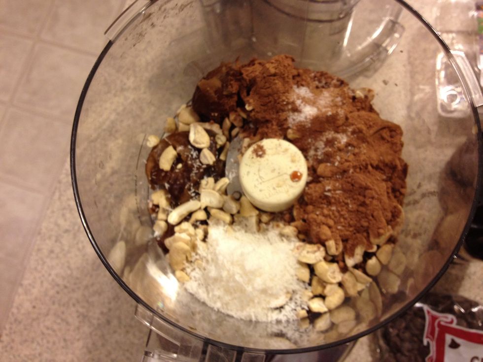 After the ingredients are in the food processor- blend them all up. Keep blending until everything is soft and it forms a ball.