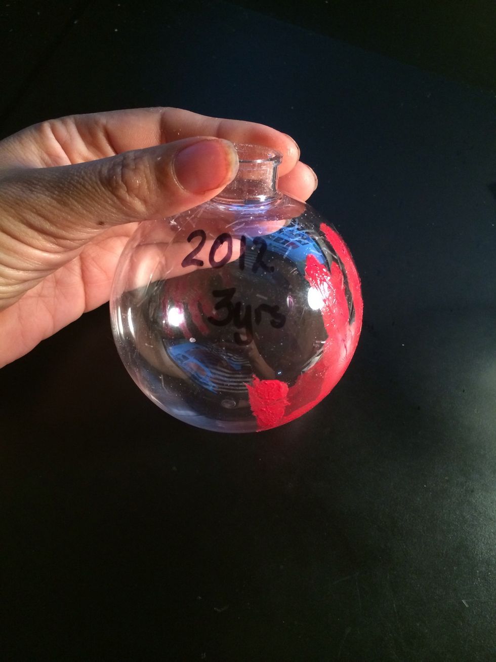 After the paint dried, I personalized it by writing my sons age and year using a permanent marker.