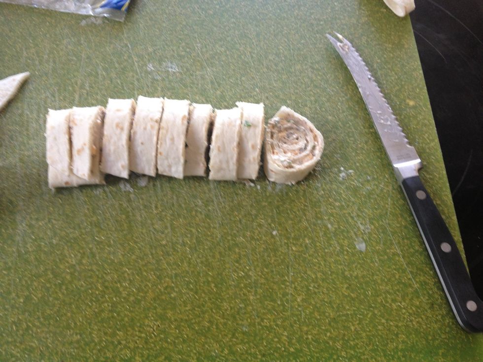 After the rolls have cooled down, slice into 1/2 inch pieces, discarding the ends.