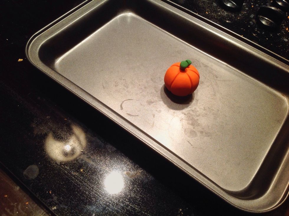 After the specified time, take your creation out of the oven. Do not grab the clay right away, because it will be extremely hot. Allow 10-15 minutes for the clay to cool.