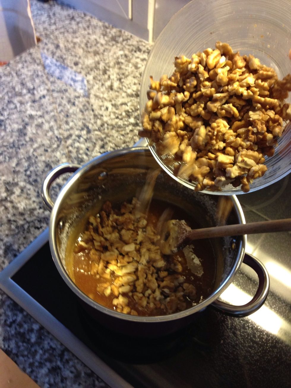 After the sugar is light brown, you add the walnuts...