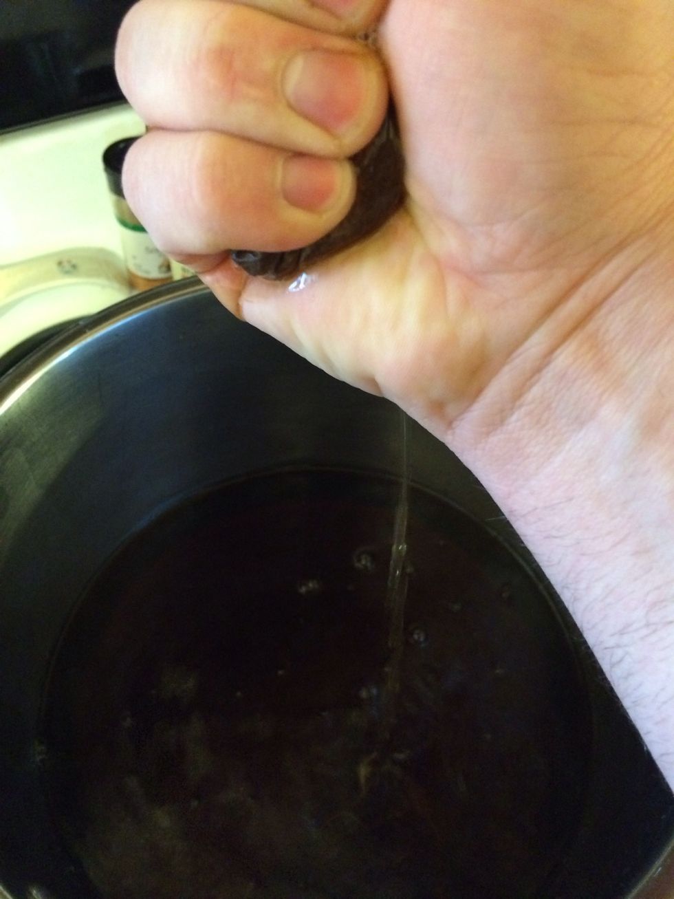 After the time is up, use a spoon or if you can handle a little heat squeeze them out with your hands. I always use my hands because I want to get every drop! Now if it's still too hot let it cool.