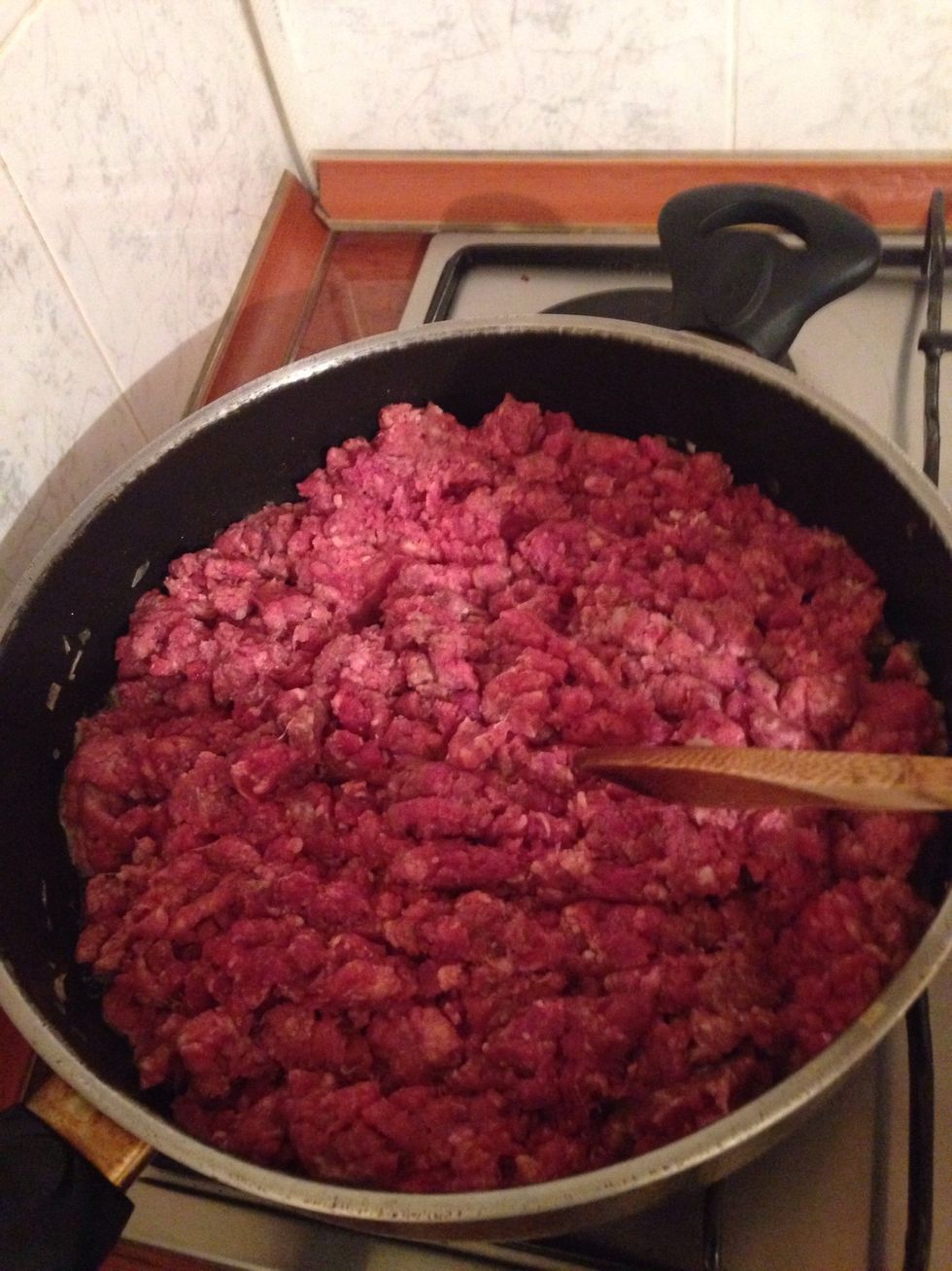 After the vegetables are half-done, take them out of the pan. Add the remaining butter and the beef into the same hot pan