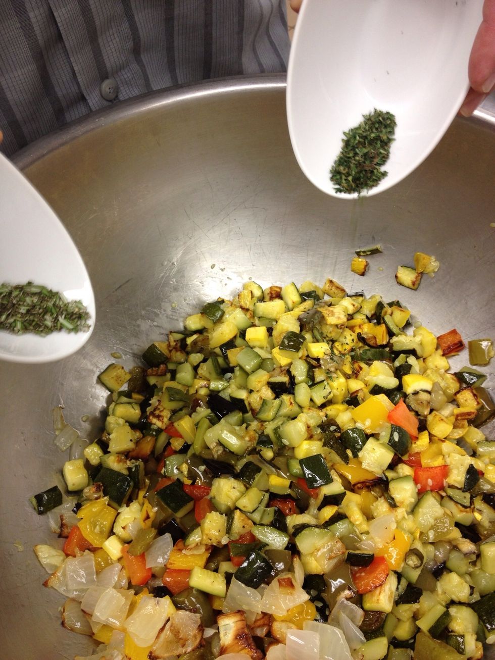 After the veggies are roasted combine rosemary, garlic, and thyme with them.