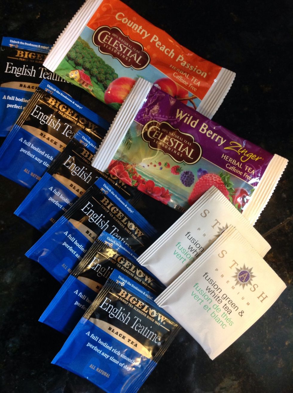 After the water comes to a boil, you can add tea. It was suggested that yeast and bacteria prefer black tea, so I typically use some black tea even with the fruity teas.