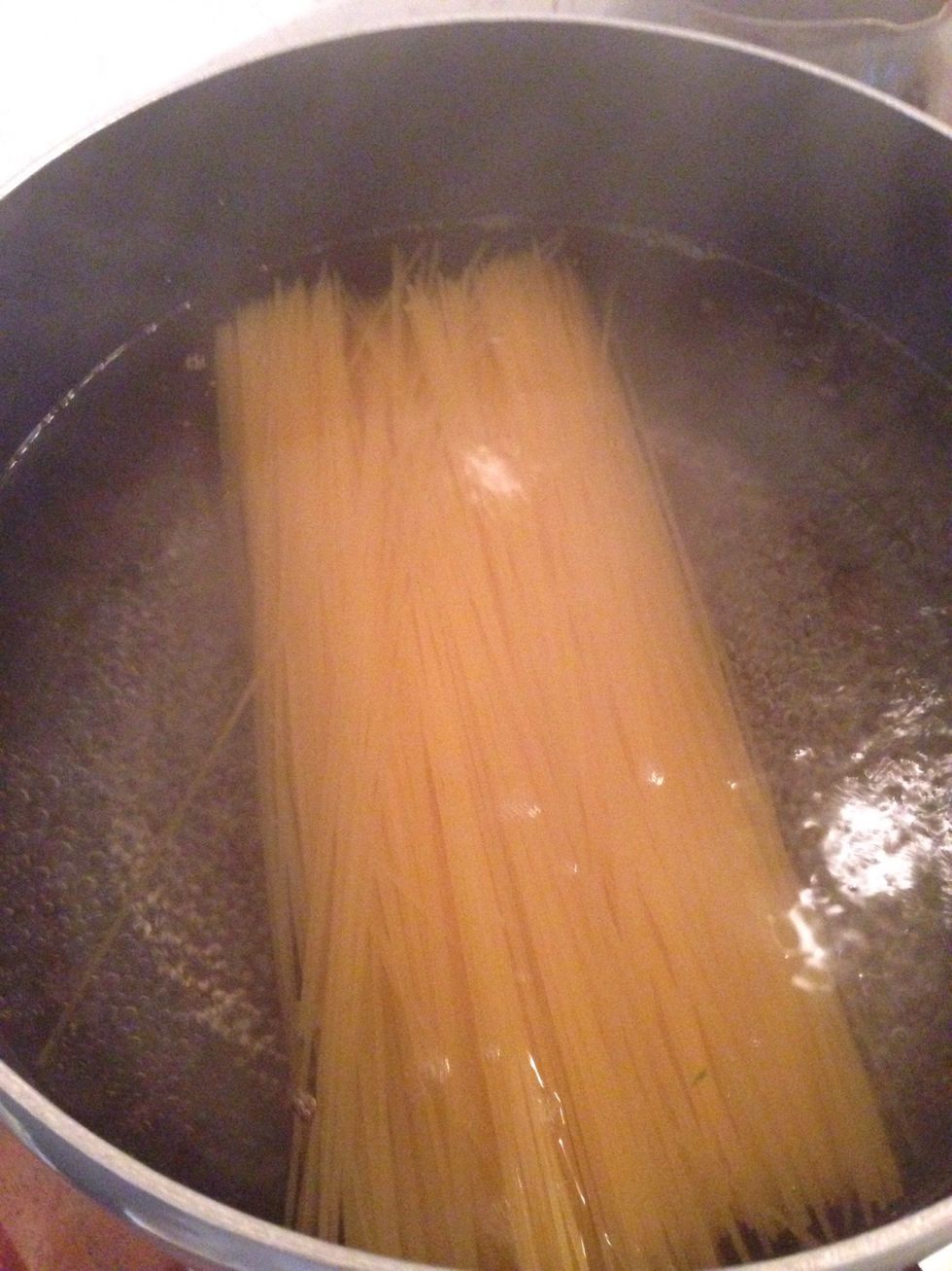 After the water is boiling add spaghetti and tow teaspoon salt and left to cook for ten minutes