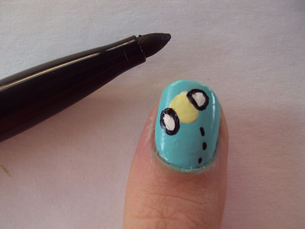 after the wings and body have dried, using a sharpie, outline the wings and add more dashes.