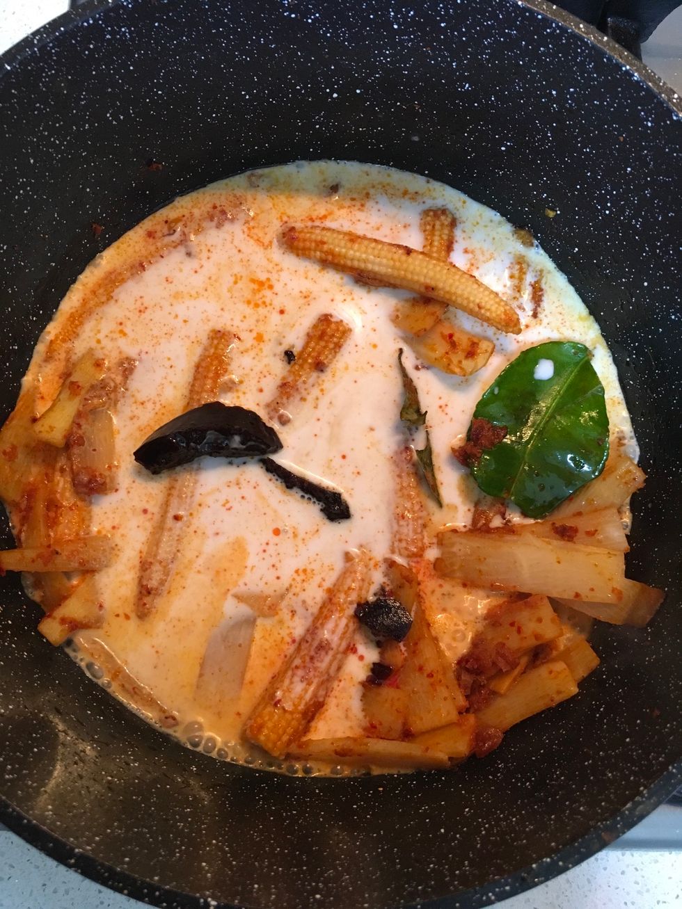 After they all mixing add up coconut milk into it