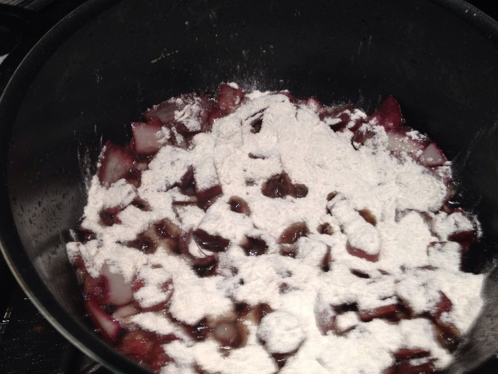 After they've been cooking for a few minutes. Cover the solids with flour.