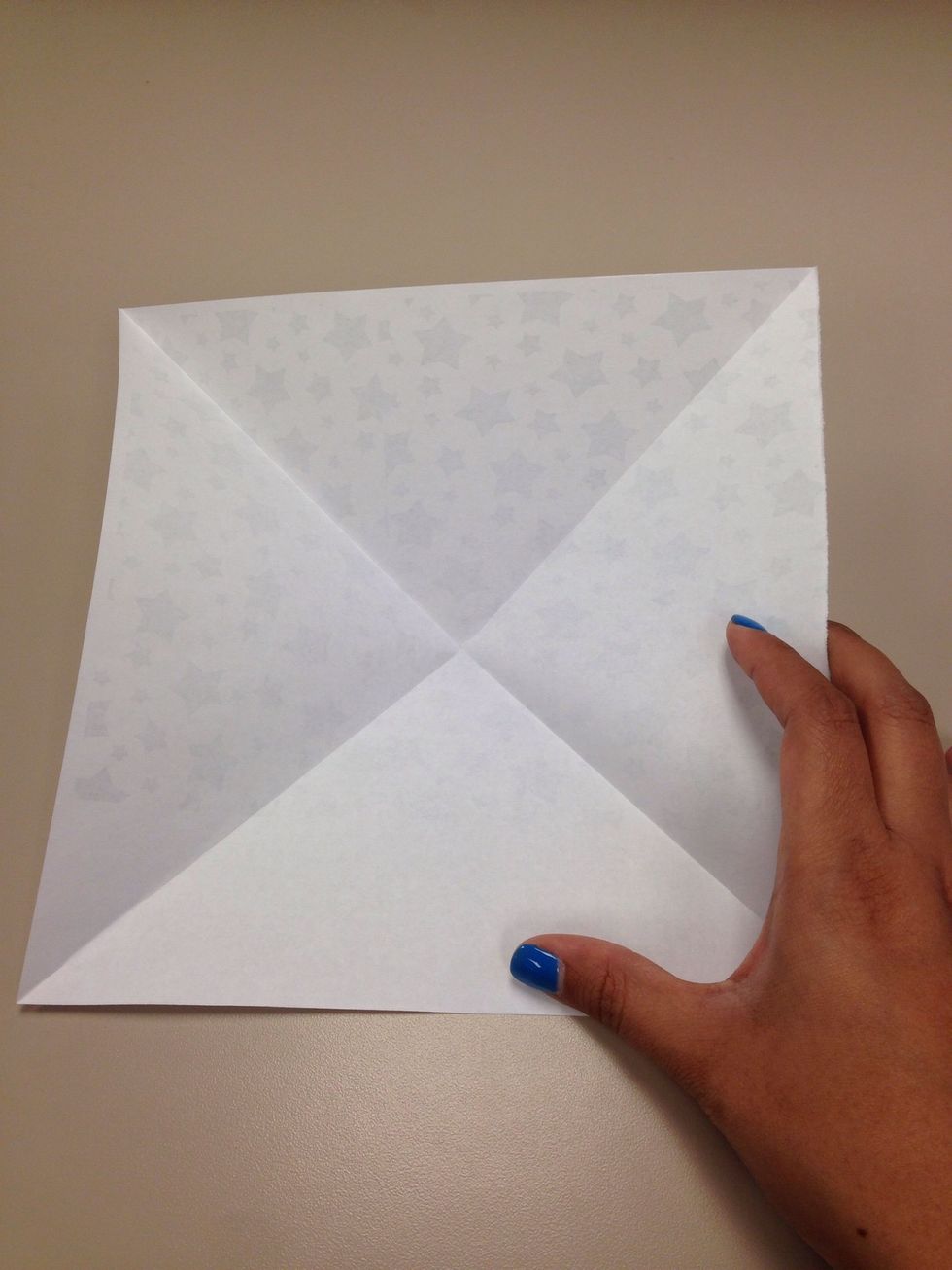 After this fold it on side and crease well