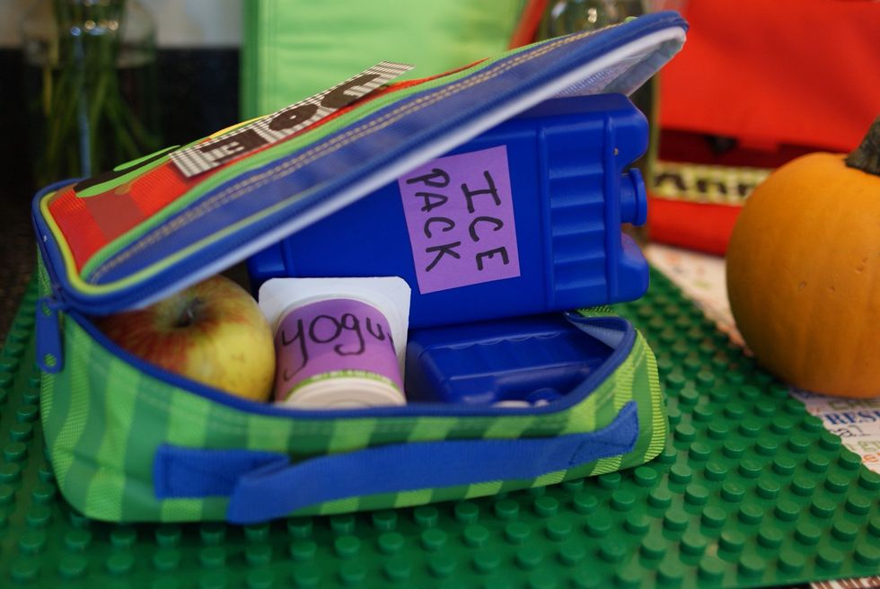 After this, place a second freezer pack on top of your food containers. Zip the lunch bag up tight and send your child off to school with peace of mind.