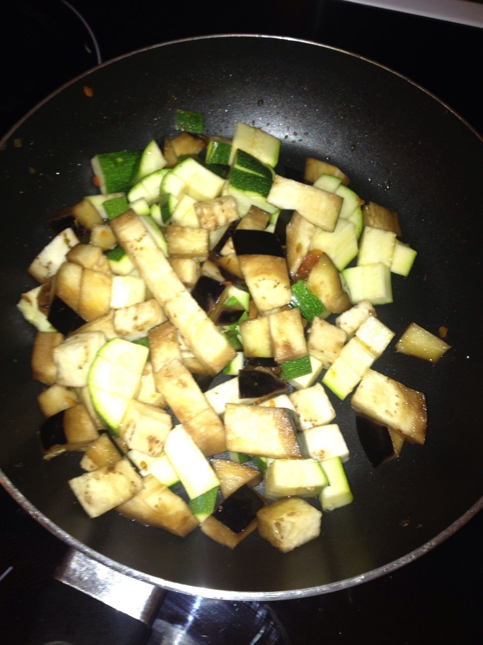 After thy absorb the flavors drain off the water add some oil or butter and cook for abut 4mins