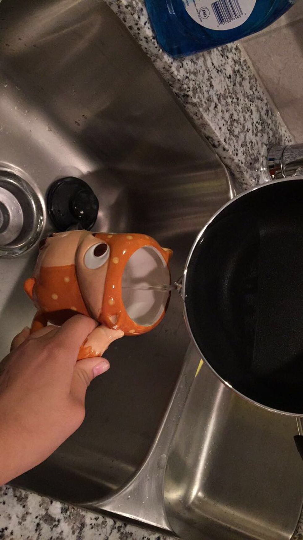 After, transfer the hot water into the mug