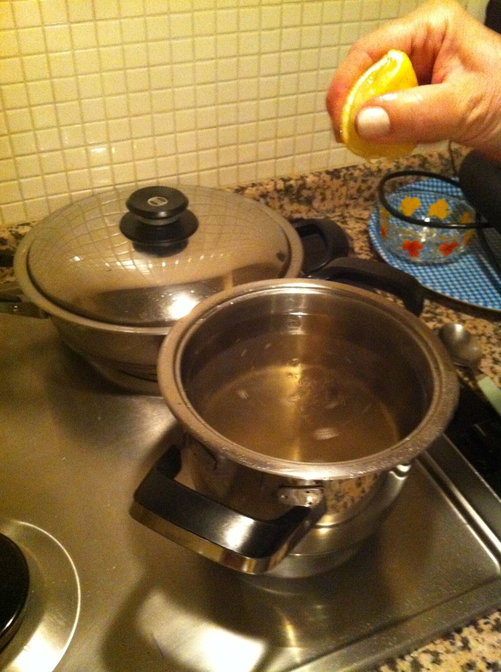 After turning of the heat , squeeze a half lemon , let the syrup cool down