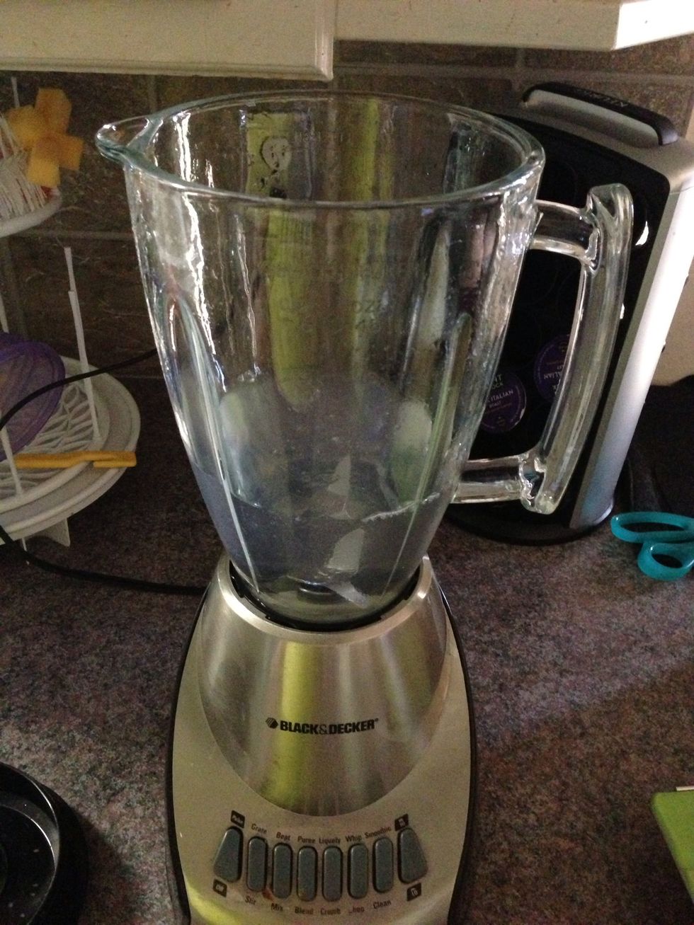 After using you blender, give it a quick rinse and fill it about a third of the way with water. Do NOT fill all the way up!