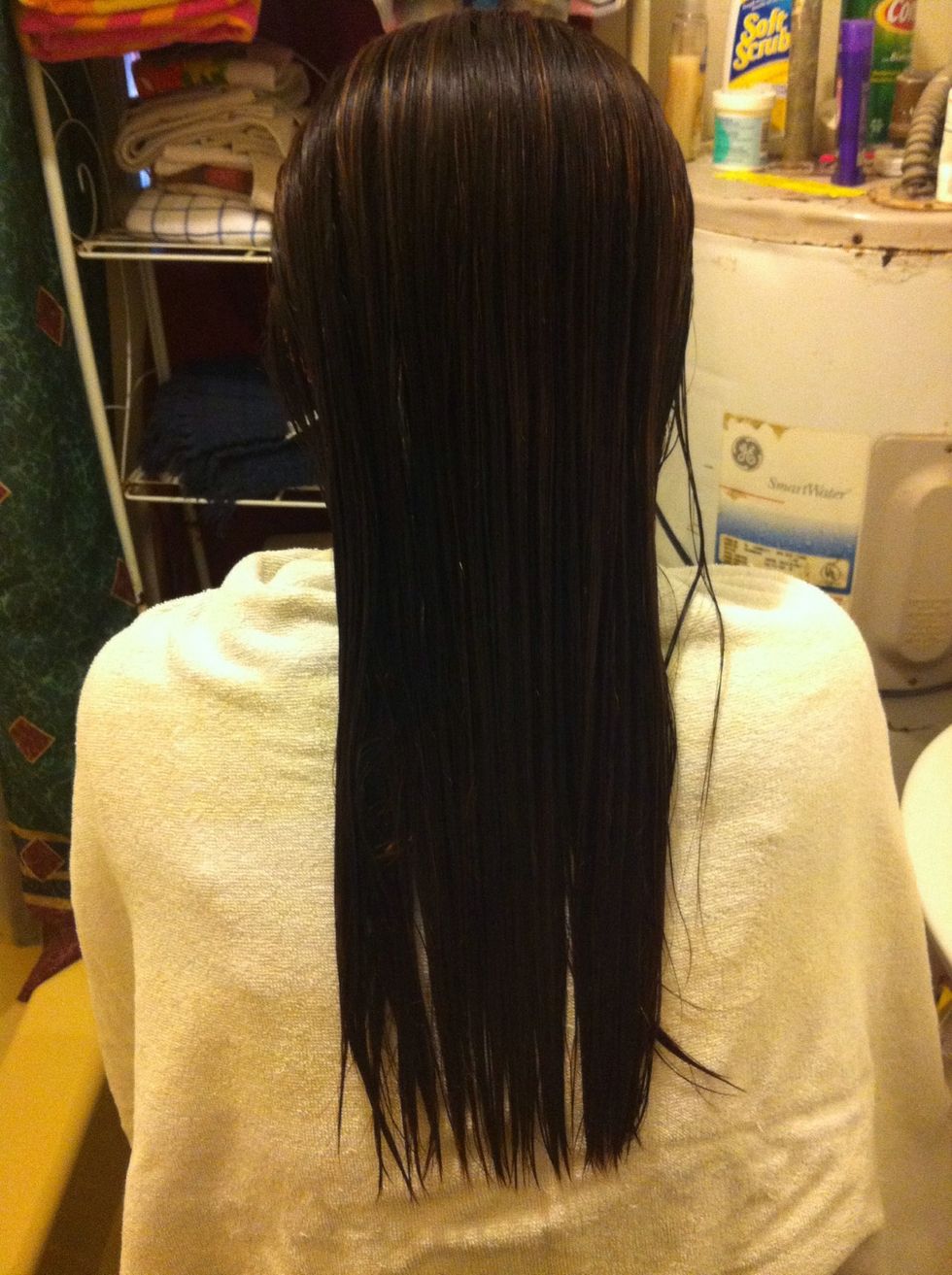 After washing, brush all hair straight back. Brush hair as smooth and straight as possible.