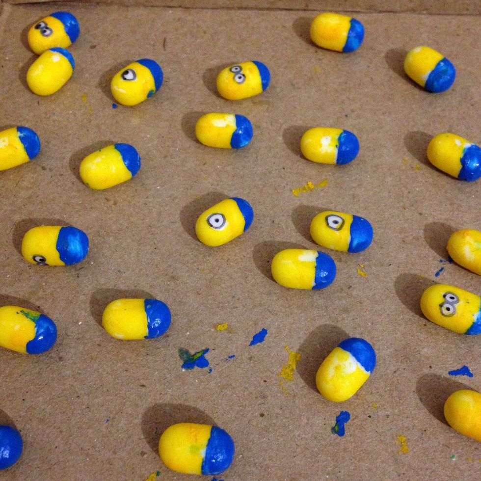 After washing your brush, paint the blue overall.