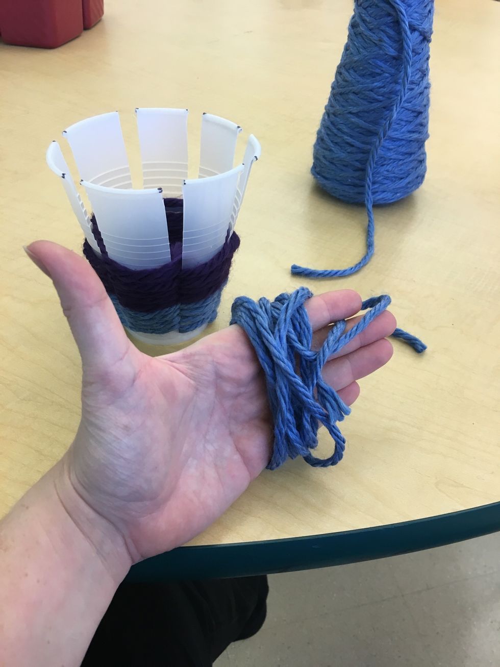 After weaving your second color through... Choose your next color and repeat the previous steps.